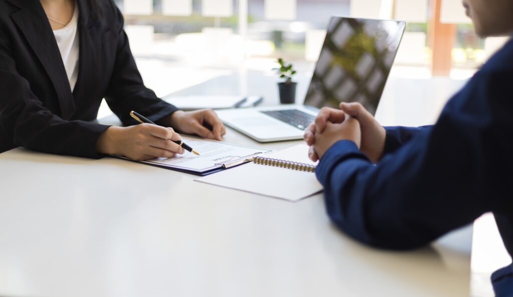 two people reviewing paperwork